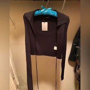 NWT Olivaceous black collared wrap top, size medium.